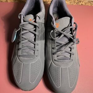 Puma Charcoal Sneakers with Vibrant Orange Accents